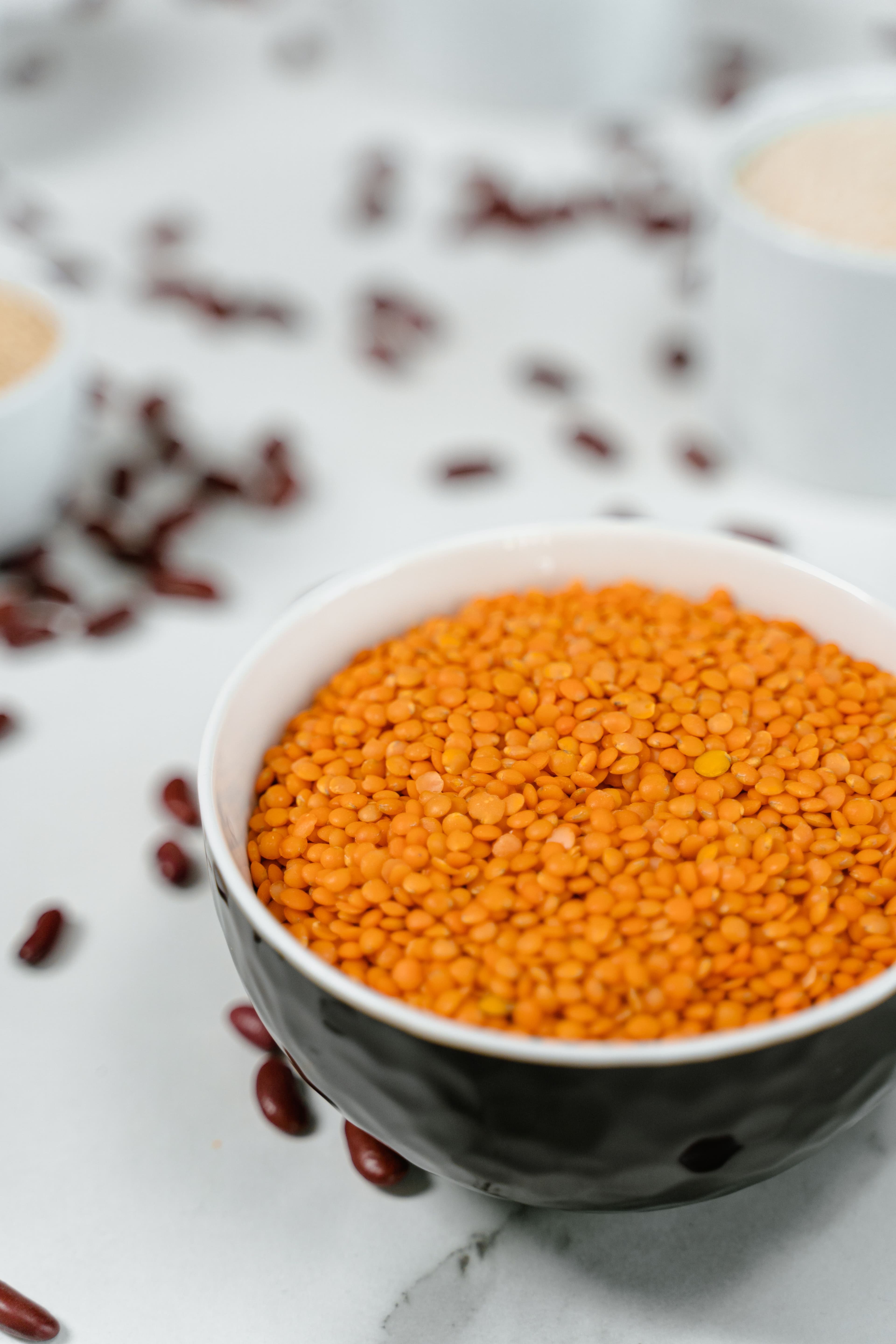 Masoor Dal - raw red lentils in a bowl