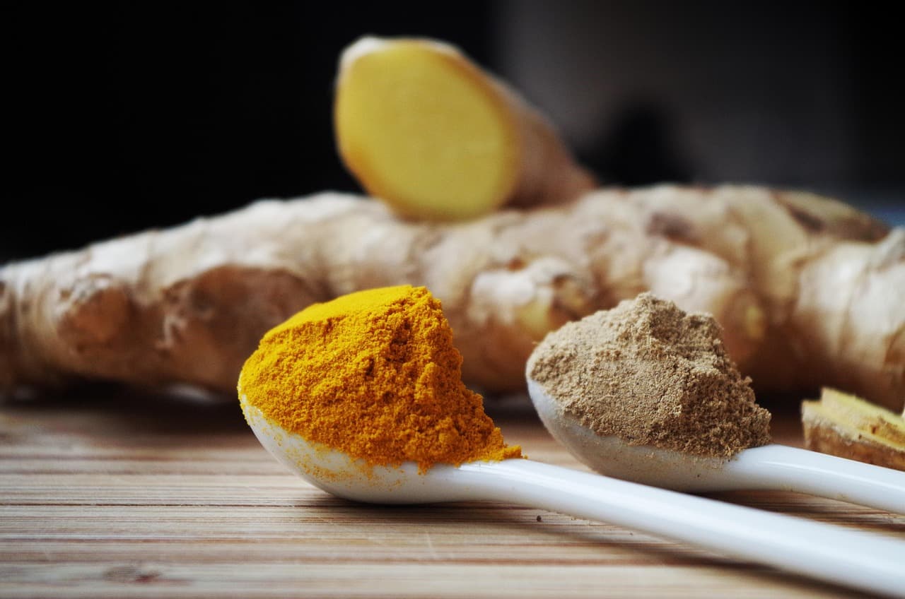 Ground ginger powder among cooking spices